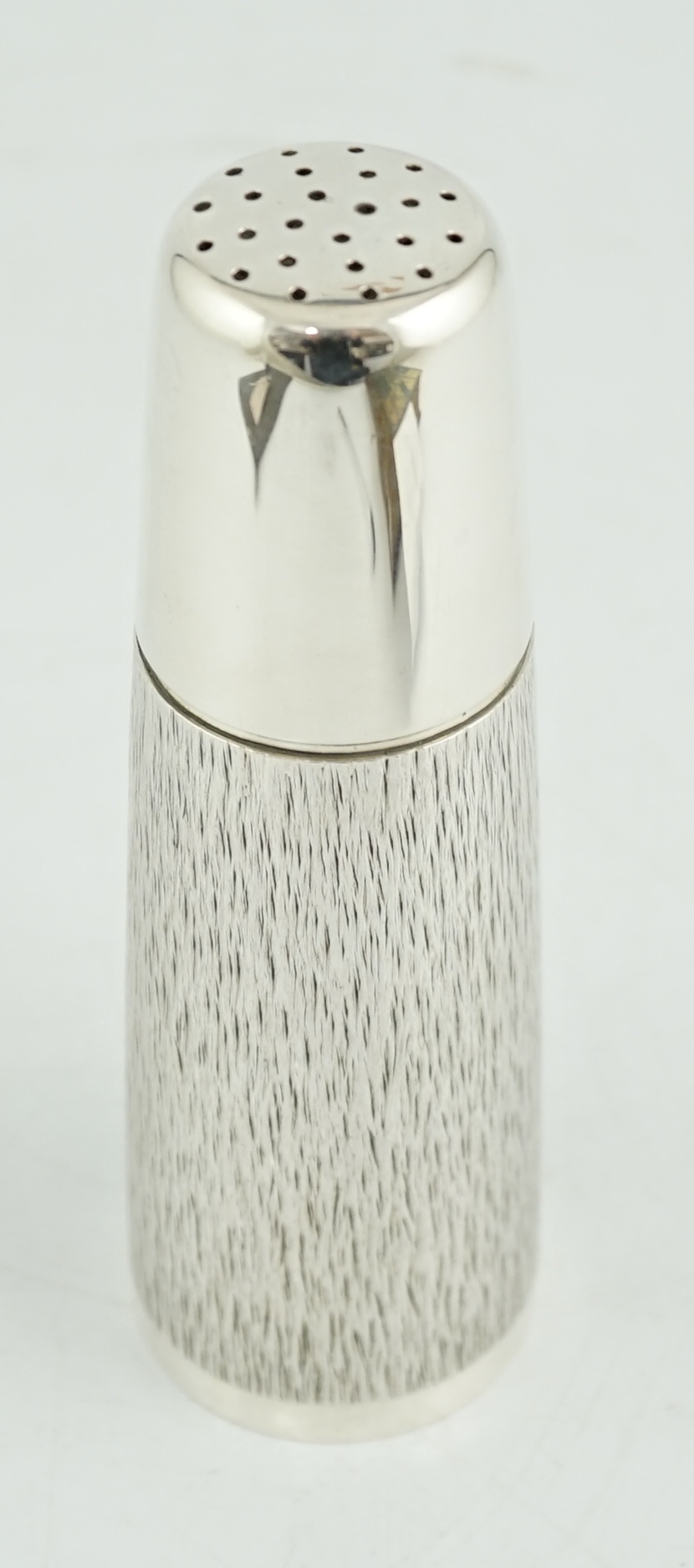 An Elizabeth II part textured silver sugar caster by Adrian Gerald Benney